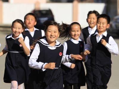 Би том болж байна